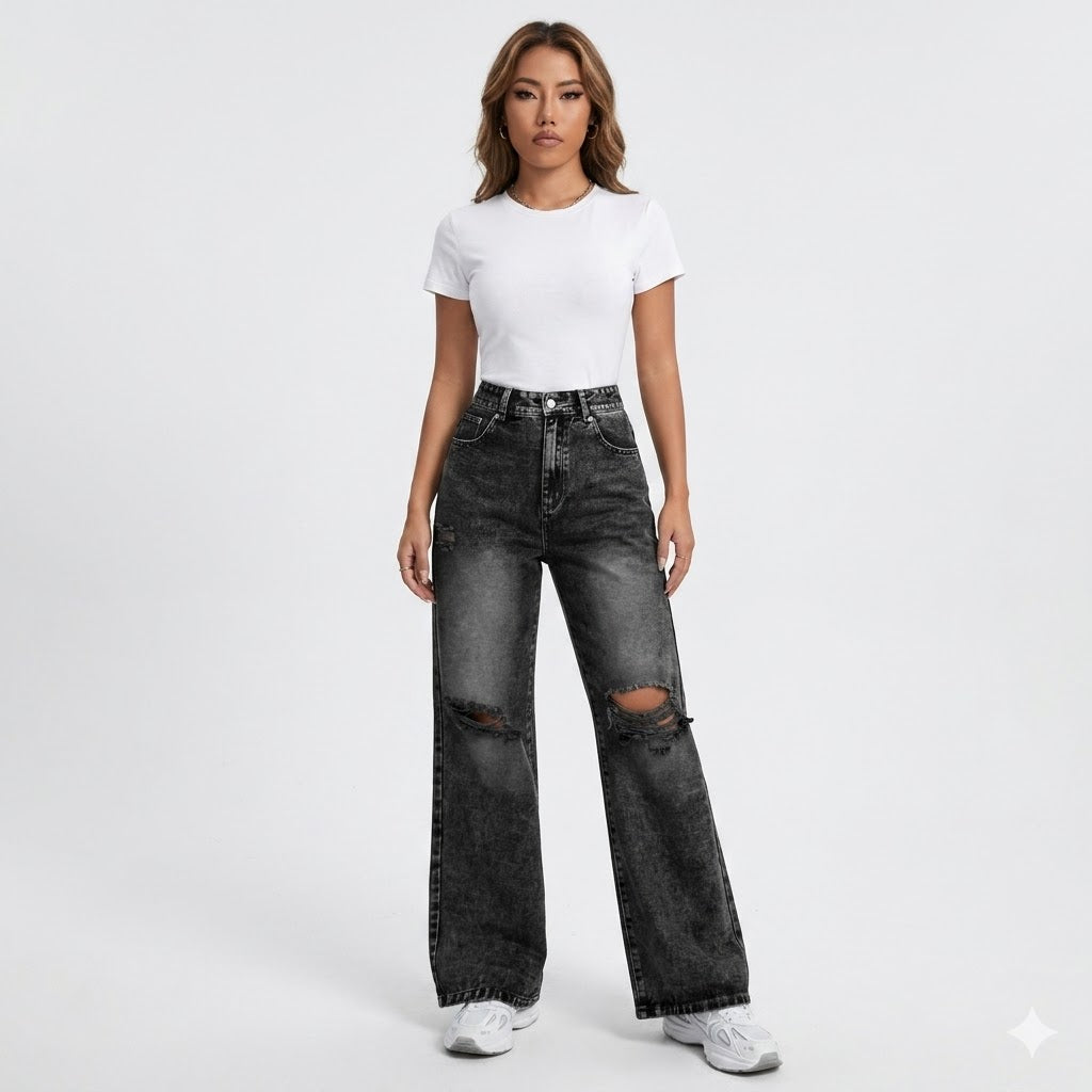 Jean noir délavé déchiré à jambe large Nelvoire — Léonie, collection femme